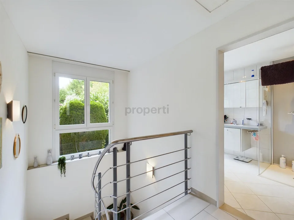 Appartamento di 3,5 locali con terrazza e vista meravigliosa a Speicher