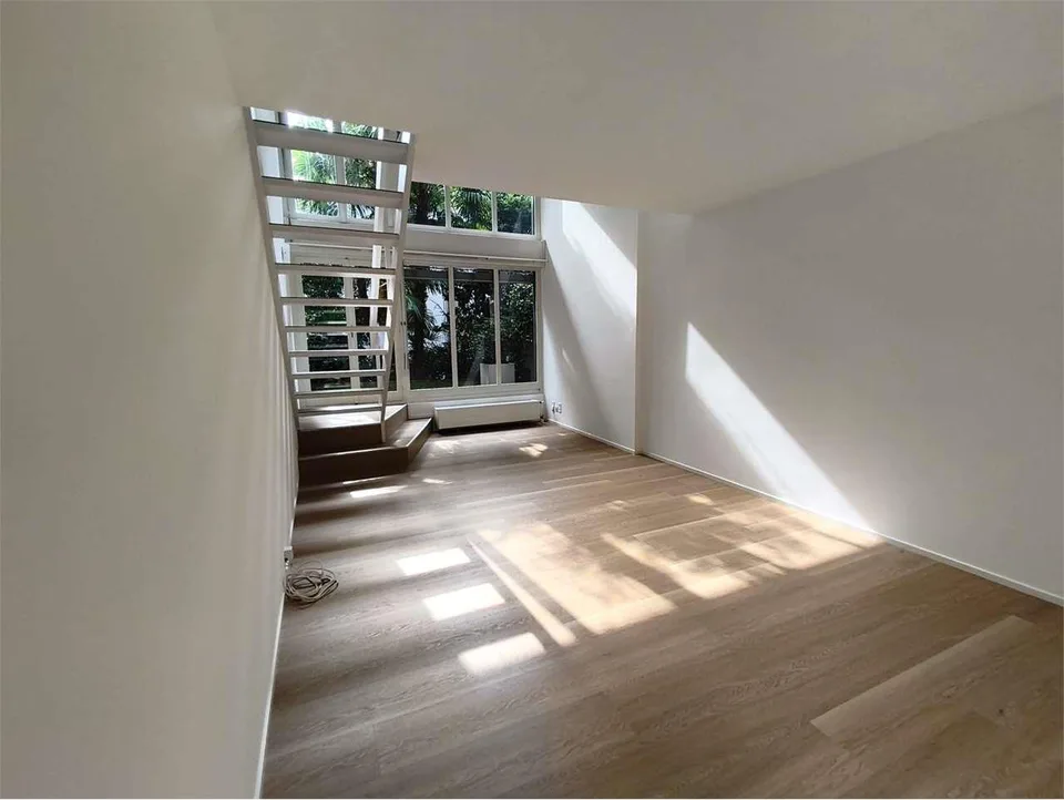 Lugano Centro (Via Cantonale) - Elegante Duplex di 47 mq con Giardino