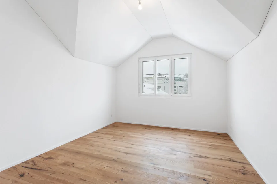 Moderne 2.5-Zimmer-Dachwohnung mit hochwertigem Ausbau und viel Charme