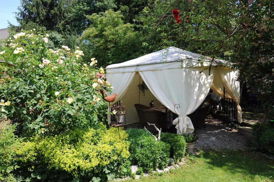 Charmante 6.5 Zimmer-Wohnung mit schönem Garten