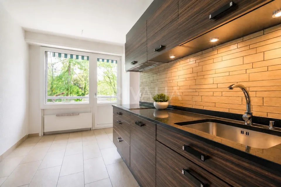 Magnifique appartement traversant dans un environnement verdoyant a...