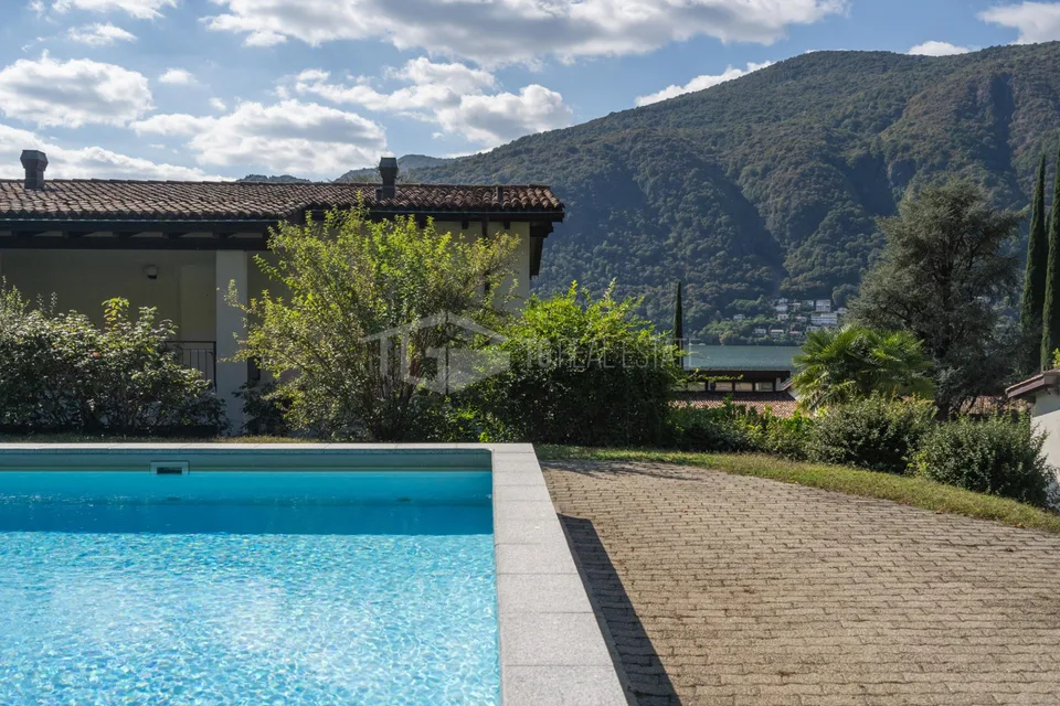 DUPLEX DA SOGNO CON VISTA LAGO, GIARDINO E PISCINA