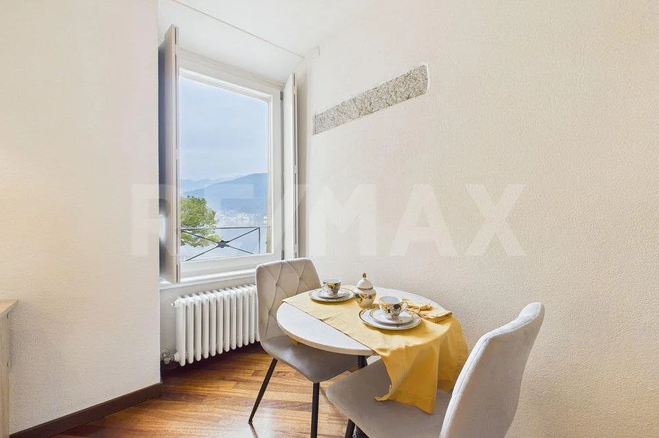 Elegante 1½ locali con vista lago a Morcote