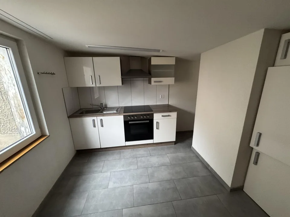 Geräumige Dachwohnung an zentraler Lage – photo 6 sur 8