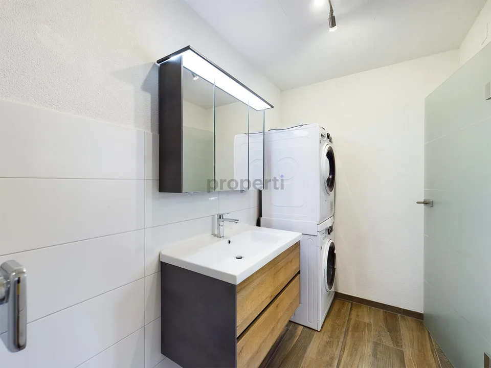 Charmant appartement 2.5 pièces dans un quartier calme de maisons unifamiliales