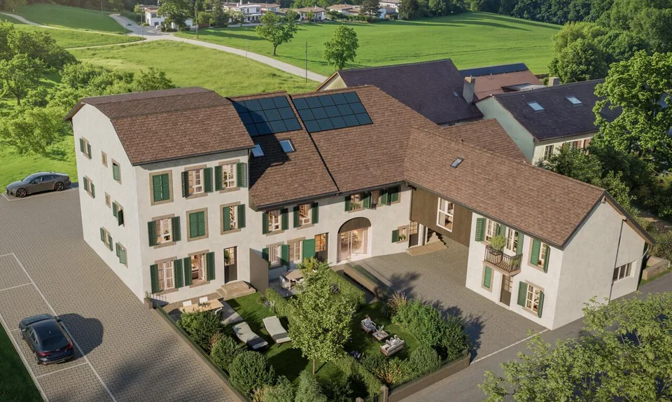 Appartement de 2,5 pièces en rez-de-jardin avec extérieur privatif