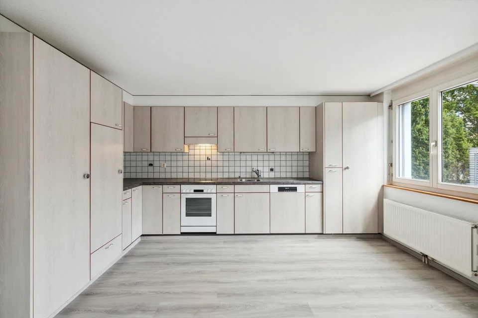 Offre spéciale - 2 pièces au 1er étage avec balcon