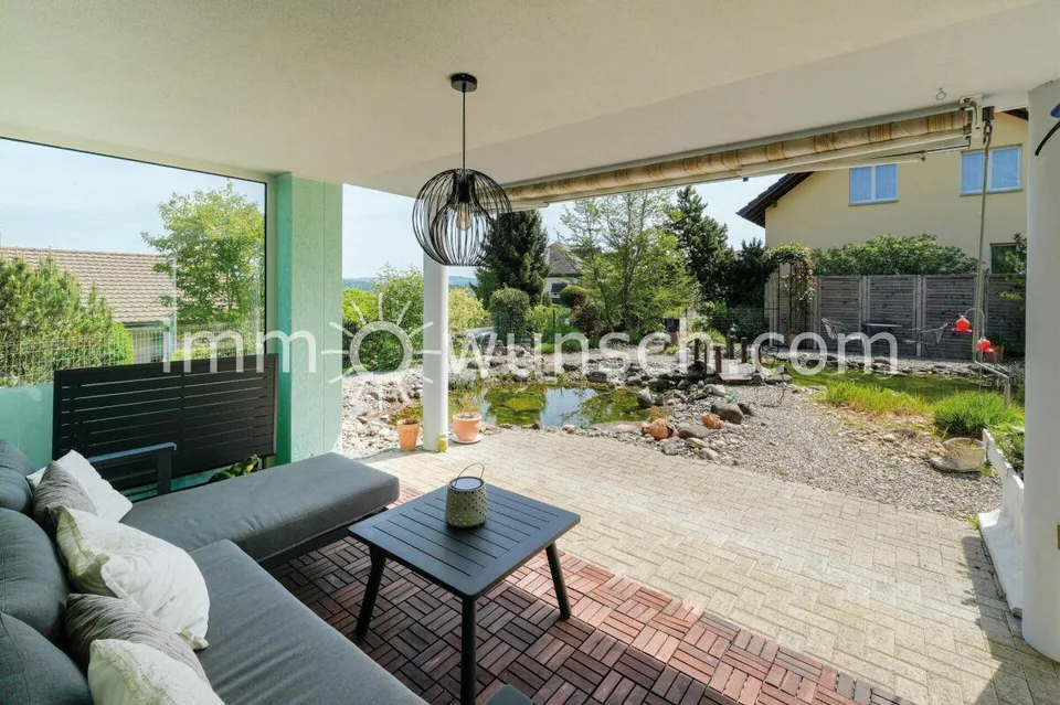 Casa familiare affascinante di 5 ½ locali con splendido giardino, in zona residenziale elevata e tranquilla