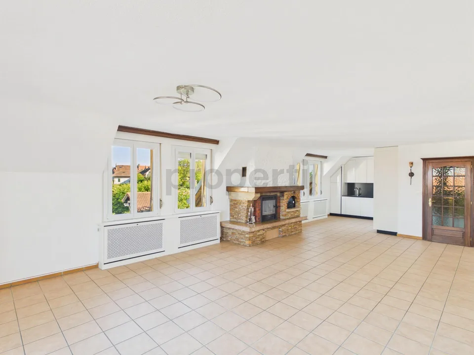 Appartamento ristrutturato di 3.5 locali con balcone e rendita locativa commerciale inclusa