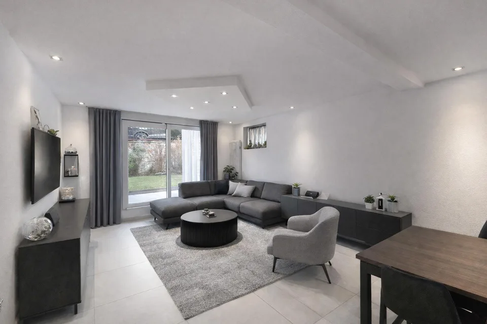 Casa bifamiliare con giardino a Canobbio
