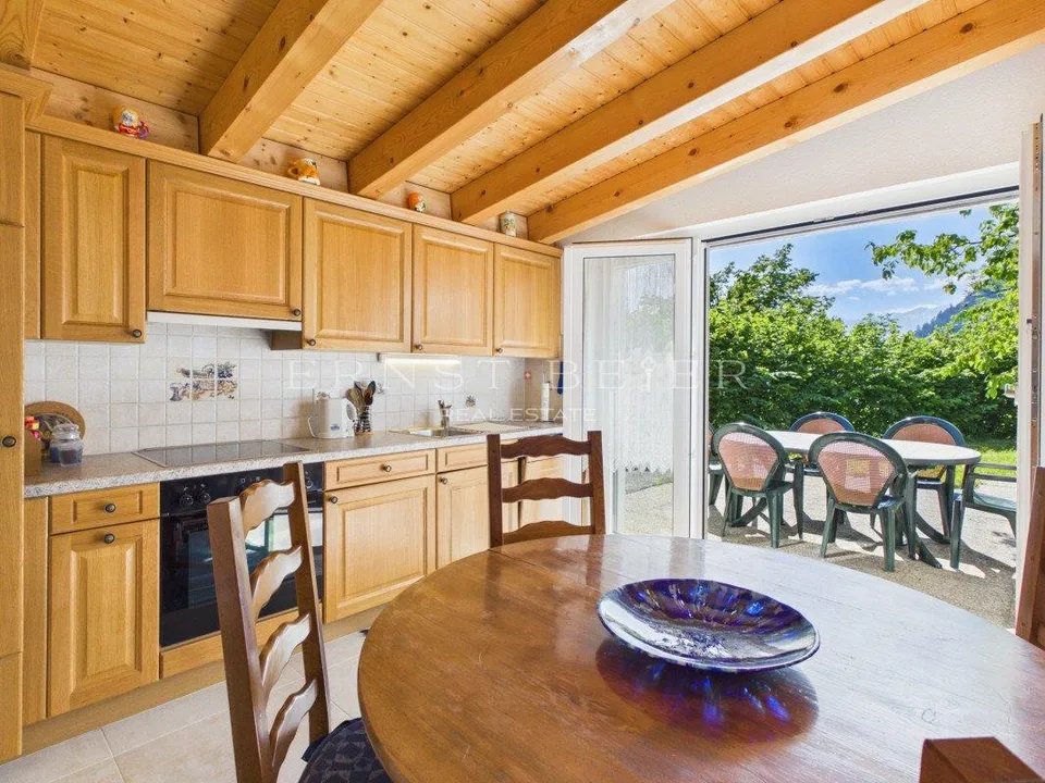 Chalet mitoyen avec cachet dans un environnement paisible et verdoyant