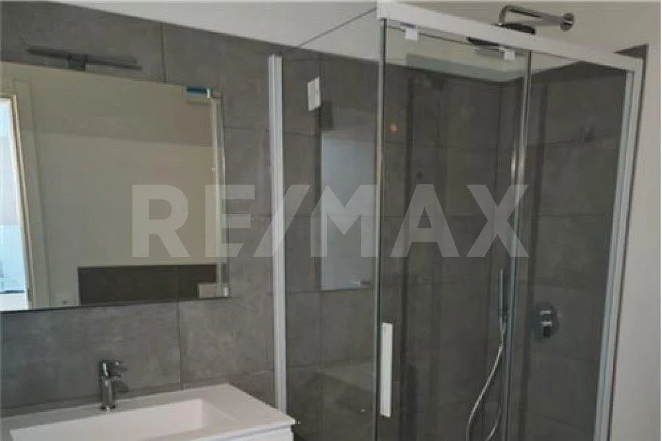 Appartement moderne 2,5 pièces avec jardin et parking