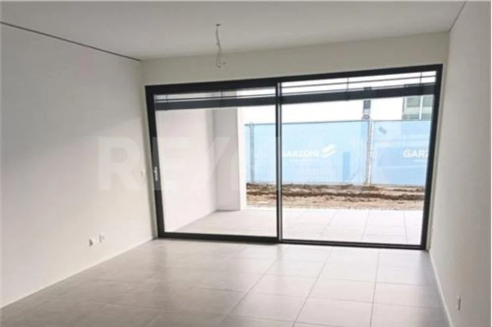 Appartement moderne 2,5 pièces avec jardin et parking