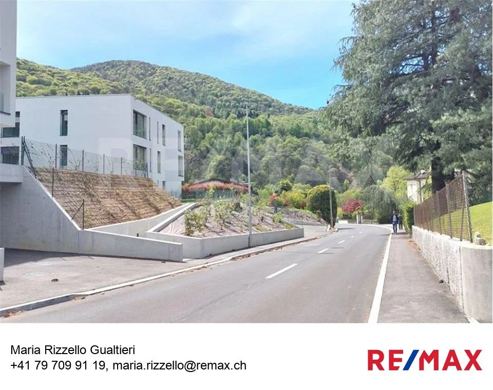 Moderno 2,5 locali con giardino e parcheggio
