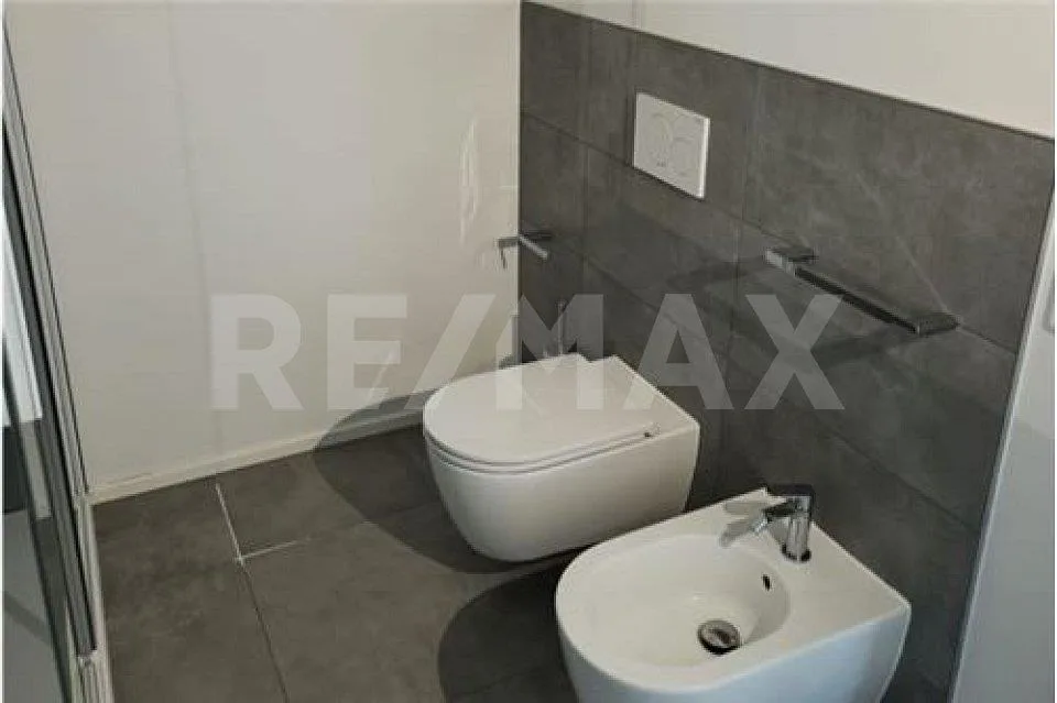Appartement moderne 2,5 pièces avec jardin et parking
