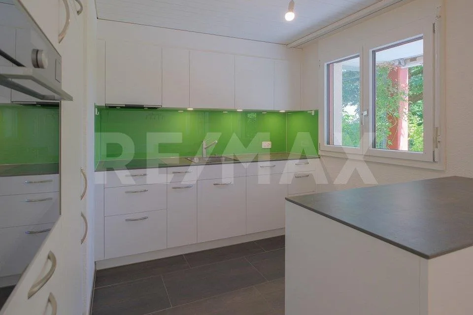 Appartement de jardin 4,5 pièces : central, calme, plein de qualité de vie