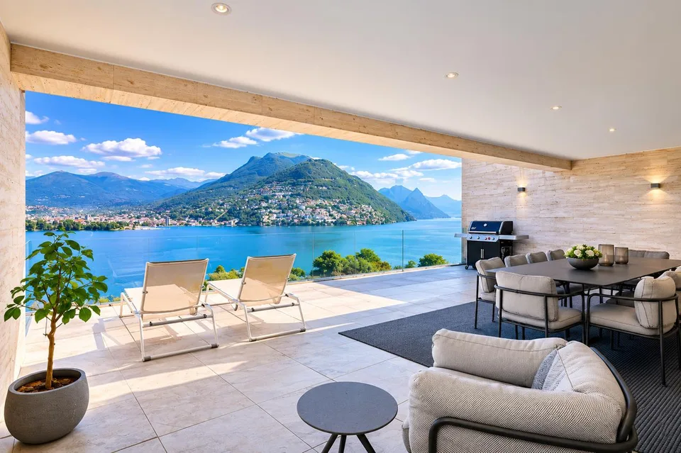 Arredato Appartamento di Lusso con Ampia Terrazza e Vista Lago