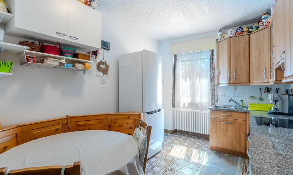 AFFASCINANTE CASA DI 4.5 LOCALI CON GIARDINO A CADENAZZO