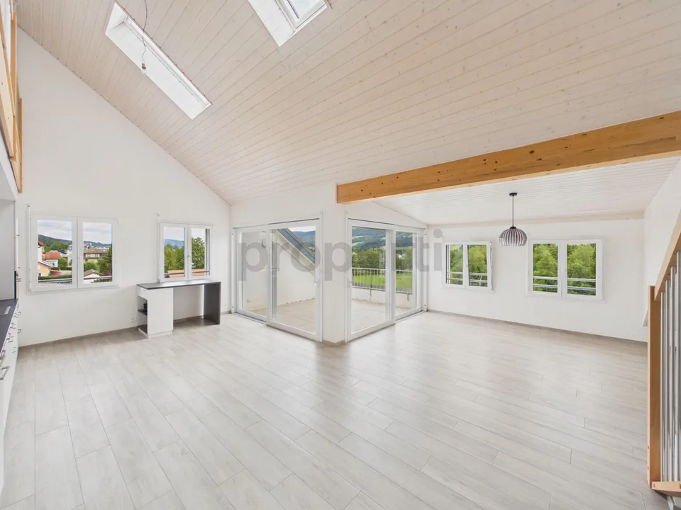Magnifique attique avec vue superbe, grande mezzanine et transports...