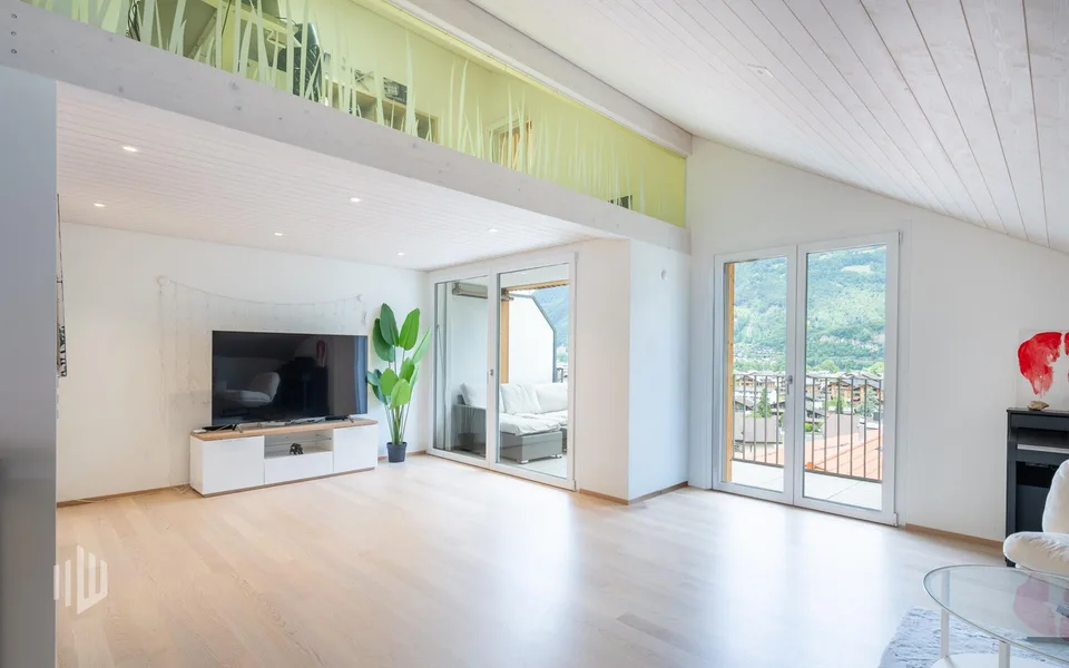 ImmoWyss -  Moderne Dachwohnung mit Sicht auf See und Berge in Bönigen
