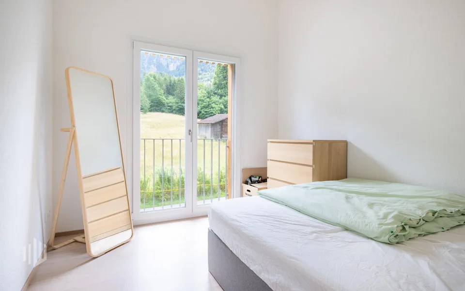 ImmoWyss -  Moderne Dachwohnung mit Sicht auf See und Berge in Bönigen