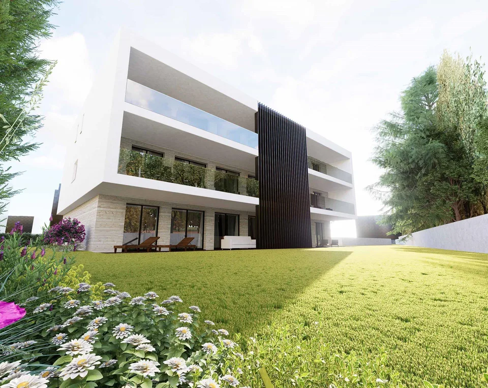 Elegante appartamento 3.5 locali con giardino a Collina d’Oro