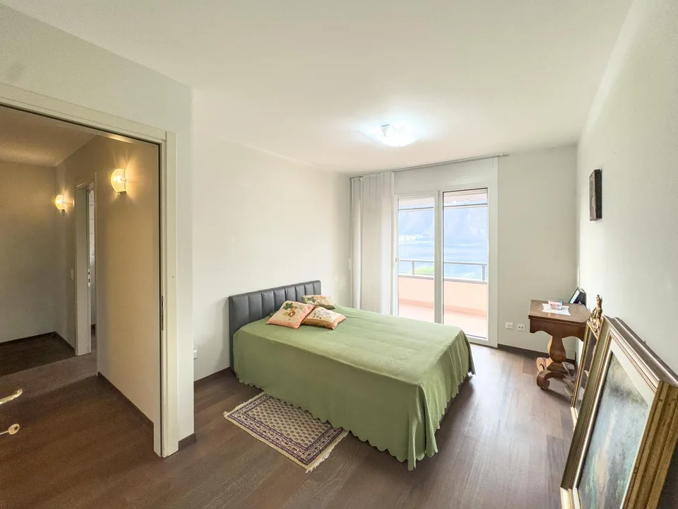 Appartamento vista lago con giardino a Bissone