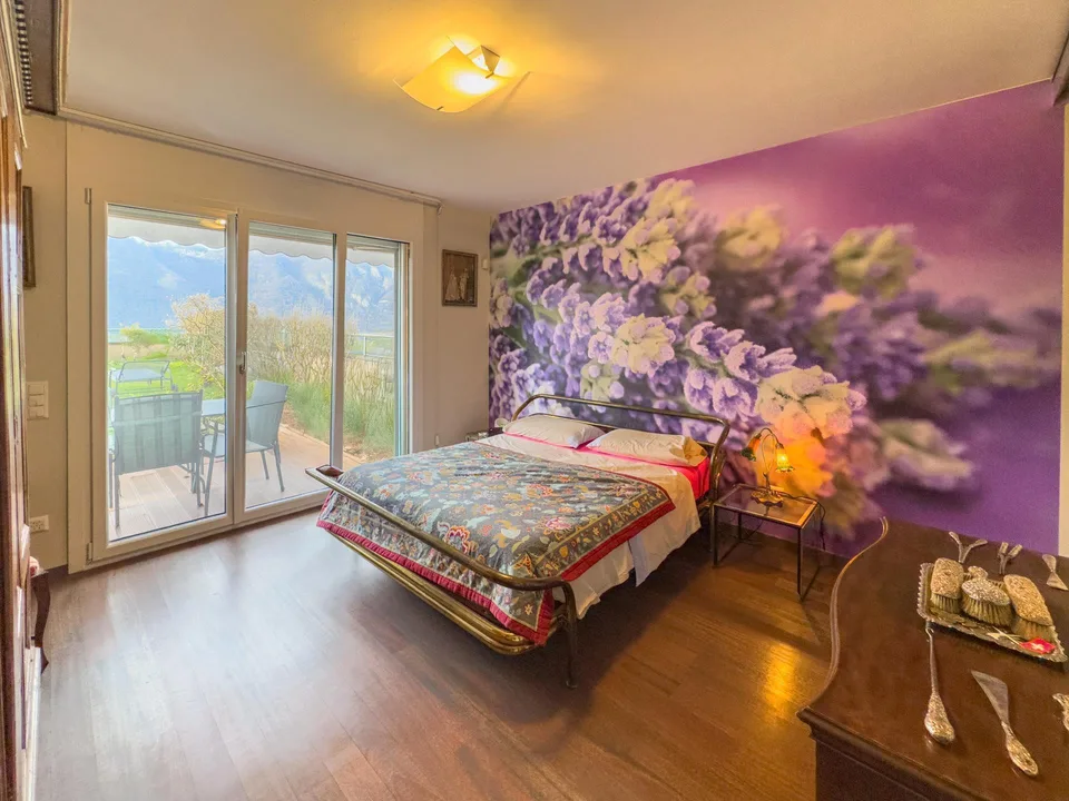 Appartamento vista lago con giardino a Bissone