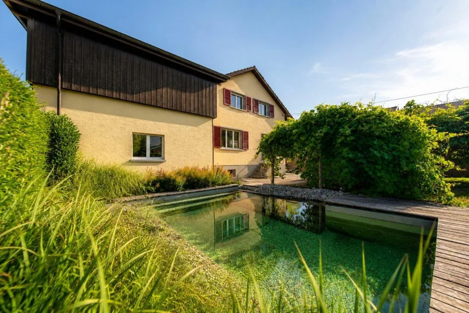 Ein Zuhause am Rhein mit Naturpool und Ausbaupotenzial - exklusives 8.5-Zimmer-Einfamilienhaus – Foto 20 von 22
