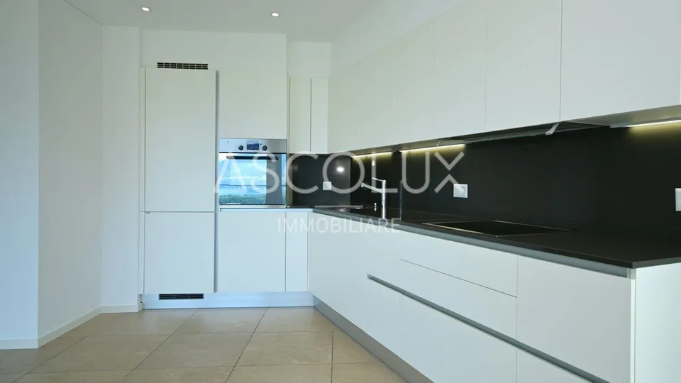 Appartamento 3.5 locali con terrazza coperta, vista panoramica e lago – foto 8 di 30