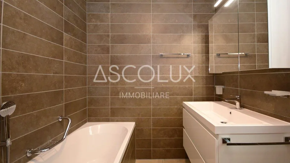 Appartamento 3.5 locali con terrazza coperta, vista panoramica e lago – foto 22 di 30