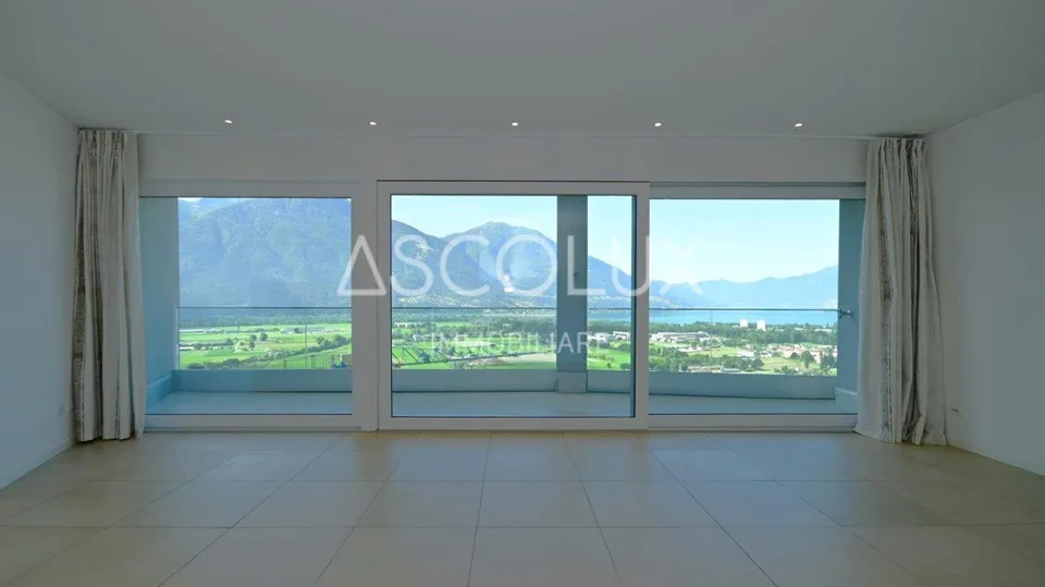 Appartamento 3.5 locali con terrazza coperta, vista panoramica e lago – foto 10 di 30