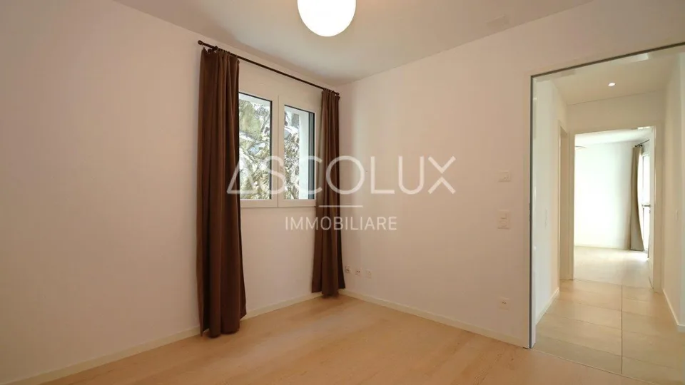 Appartamento 3.5 locali con terrazza coperta, vista panoramica e lago – foto 20 di 30