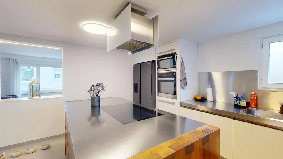 6.5 Zimmer Doppelhaushälfte mit eigenem Garten und Studio