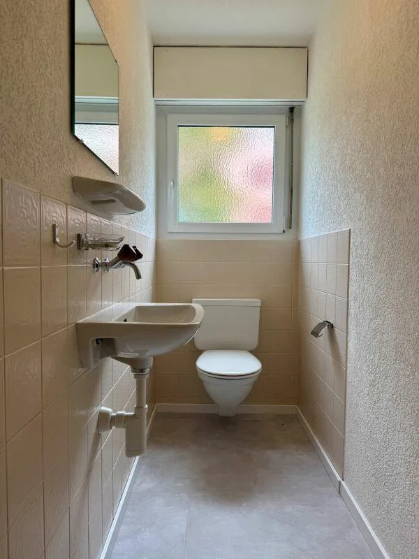 5.5-Room Ground Floor Apartment with Winter Garden and Land Share