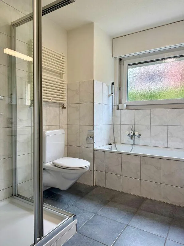 5.5-Room Ground Floor Apartment with Winter Garden and Land Share