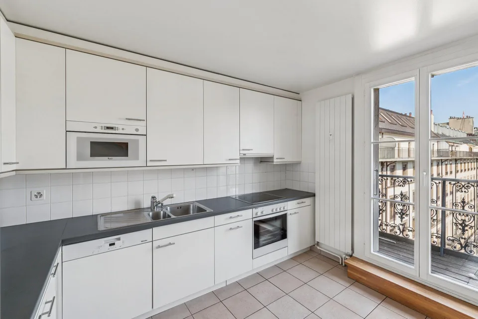 Meraviglioso duplex ristrutturato di 7 locali con balcone nel cuore di Ginevra