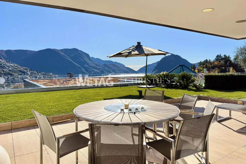 Wohnung in Porza mit privatem Garten & Blick auf den See zu mieten