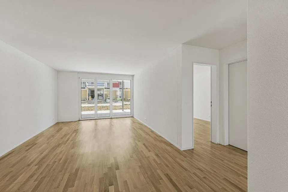 Moderne Wohnung mit Gartensitzplatz