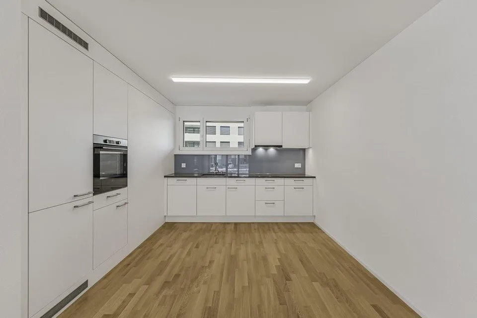 Moderne Wohnung mit Gartensitzplatz