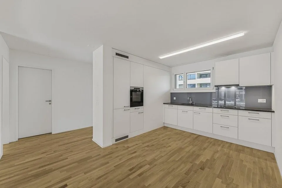 Moderne Wohnung mit Gartensitzplatz