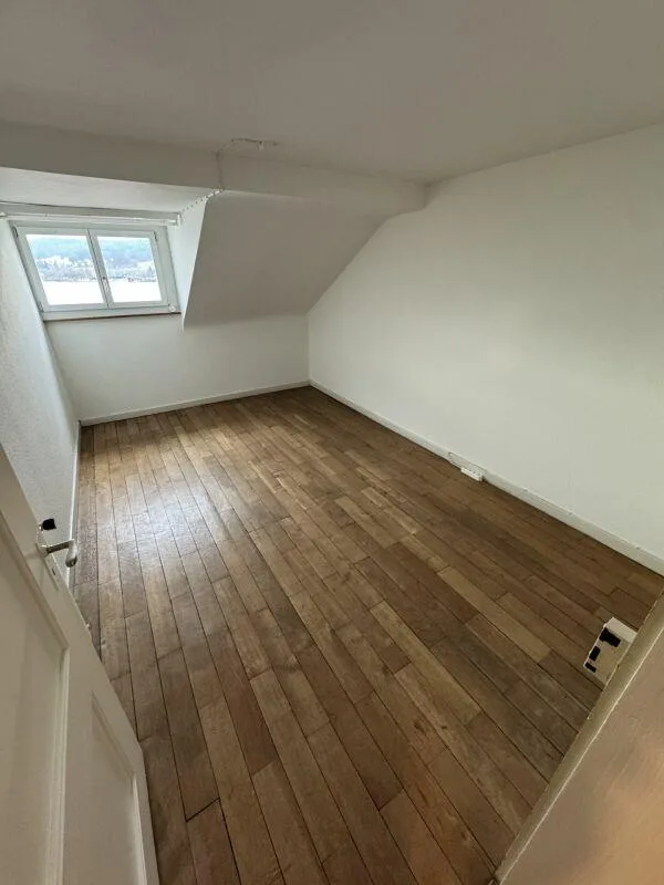 Mansarde-Zimmer mit Seeblick