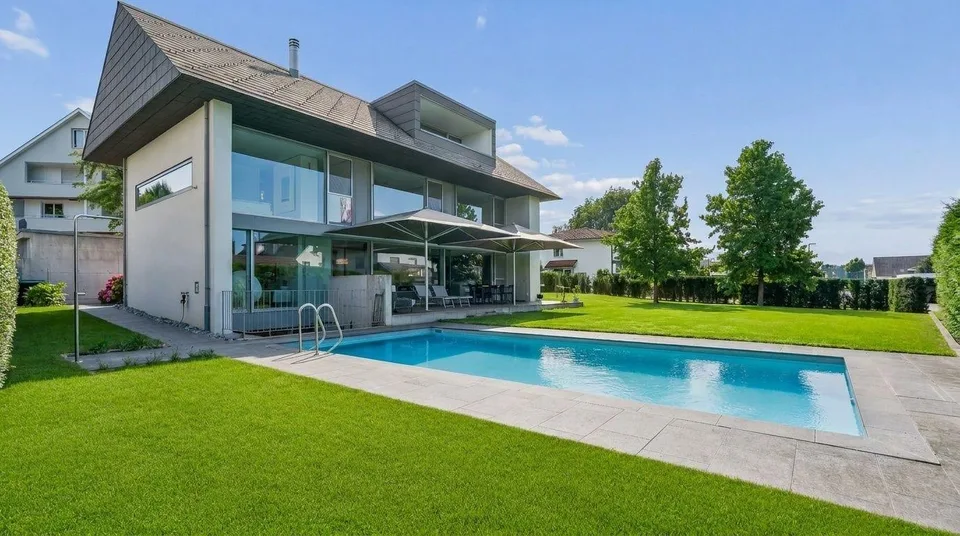 Wohnen wie im Ferienresort - Architektenhaus mit Pool und Garten