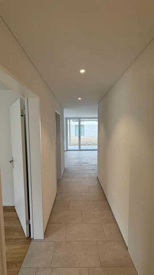 2.5-Zimmer-Gartenwohnung im Neubau mit 42 m² Privatgarten – Erstbezug