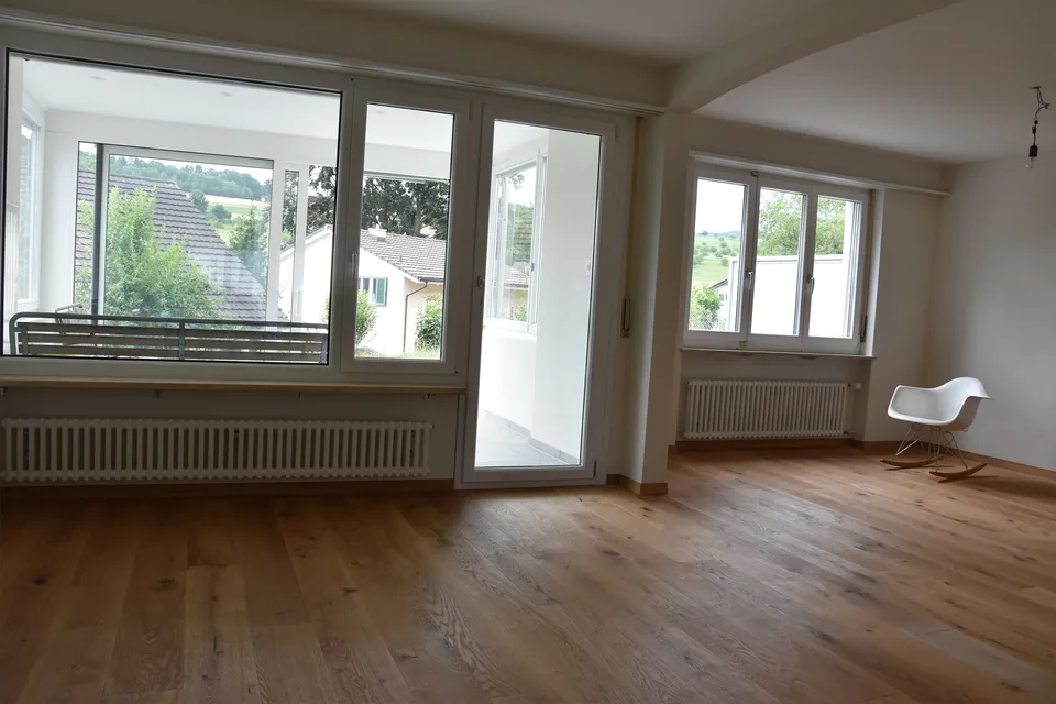 Kubisches Doppeleinfamilienhaus mit Wintergarten und Garage