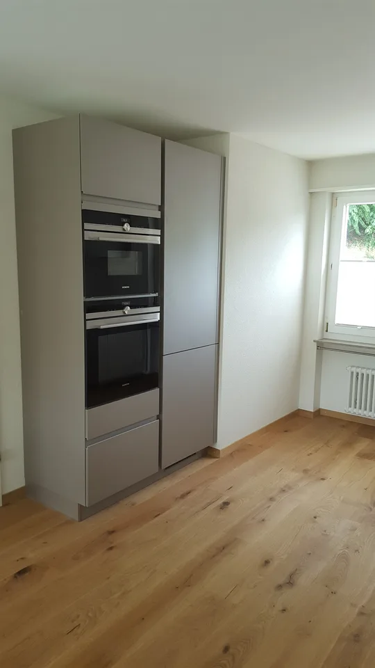 Kubisches Doppeleinfamilienhaus mit Wintergarten und Garage