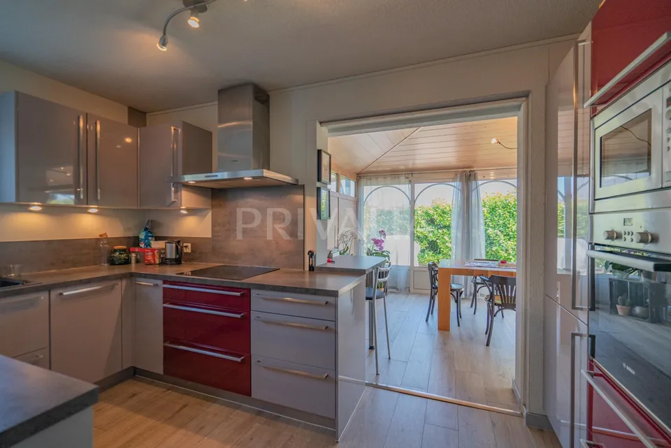Belle maison mitoyenne en pignon avec jardin exposé plein sud