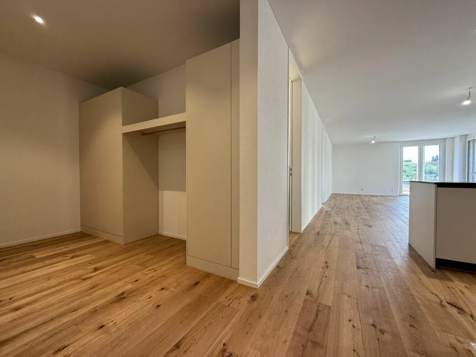 Paradiso di 3,5 locali con grande quota di giardino nel quartiere Ziegelei a Berg (E0.3)