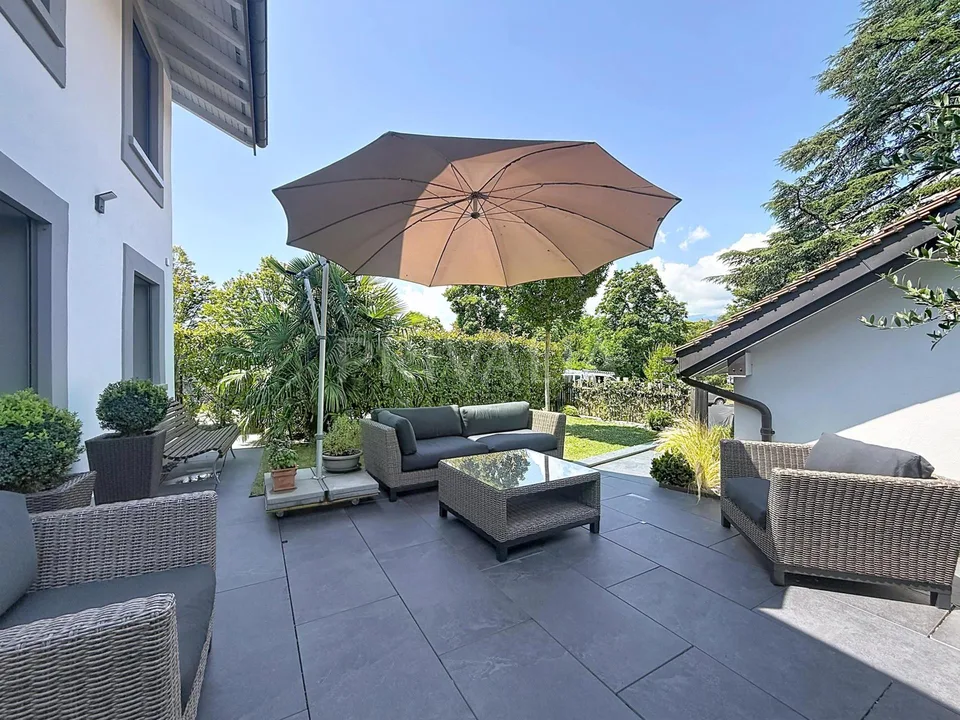 Élégance et confort dans une maison familiale avec jardin à Satigny