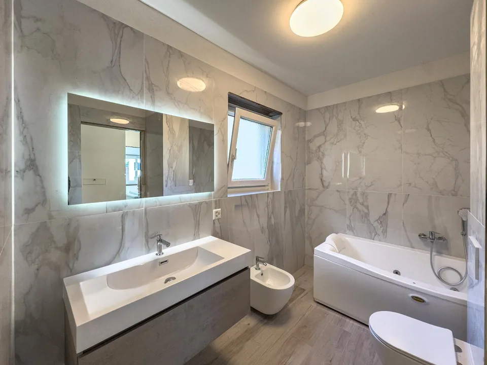 Appartamento 3.5 locali con parziale vista lago a Melide